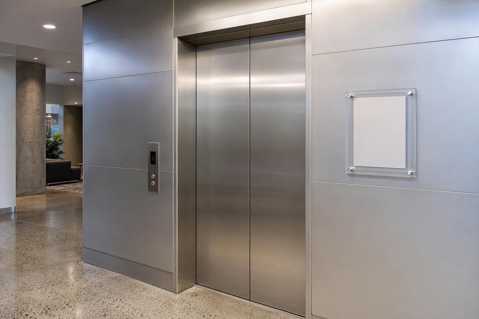 Current elevator inspection certificate displayed beside stainless steel elevator doors in a Los Angeles office building lobby, a key compliance indicator for maintenance contract adequacy.